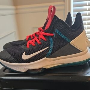 Nike Kids Black and Red Sneakers with Blue Accents